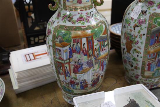 A pair of large Chinese Canton-decorated twin handled vases, Daoguang Period (1821-50), 64cm, slight faults to handles